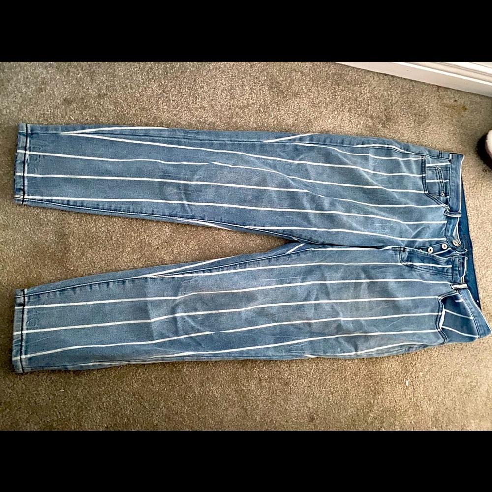 Blue jeans with white stripes